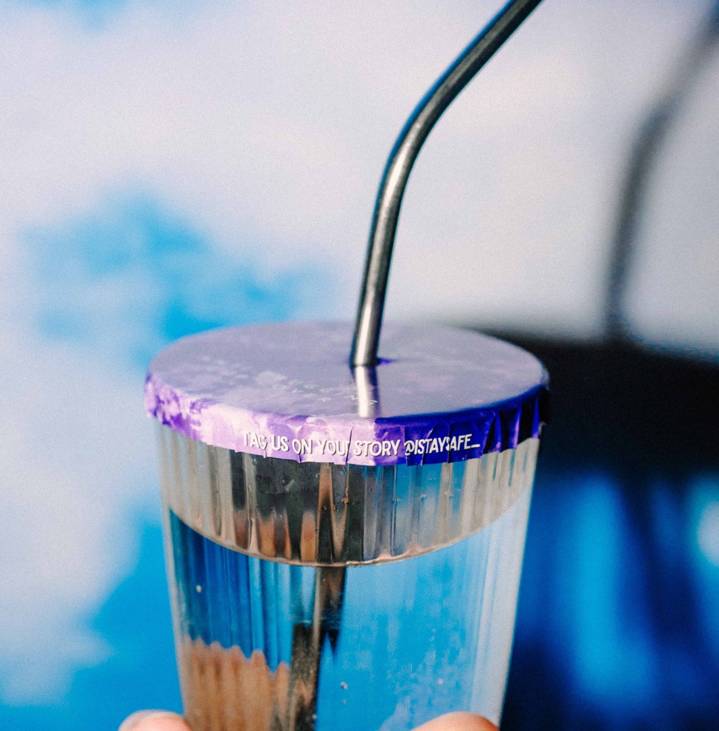 ISTAYSAFE cup cover with purple rim and straw with text - TAG US ON YOUR STORY.